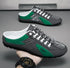 Gray and green low-top streetwear sneakers with white laces and slip-on fit