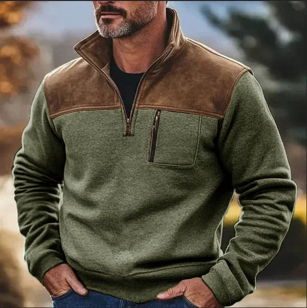 Men's olive green fleece pullover with brown faux leather shoulder panel, half-zip, relaxed fit