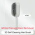 White 3D self-cleaning hair brush with pressed bristles, ergonomic handle, and minimalist design.
