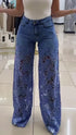 Wide leg blue denim pants with sheer floral lace panels, high waist, relaxed fit, streetwear style