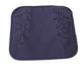 Dark square fabric pad with textured silicone grips and reinforced edges