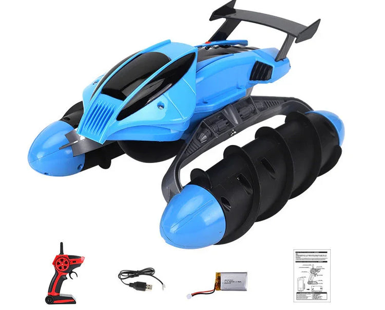 Blue and black remote control stunt car with oversized wheels, includes controller and battery