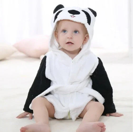 Baby in soft black and white panda hooded romper, plush material, loose fit