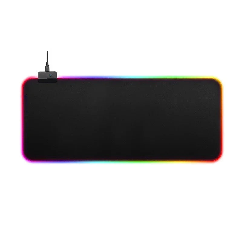Large black RGB gaming mouse pad with soft fabric surface and vibrant LED edge lighting
