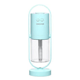 Modern light blue portable humidifier with clear water tank and minimalist design