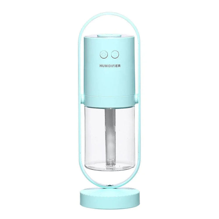 Modern light blue portable humidifier with clear water tank and minimalist design