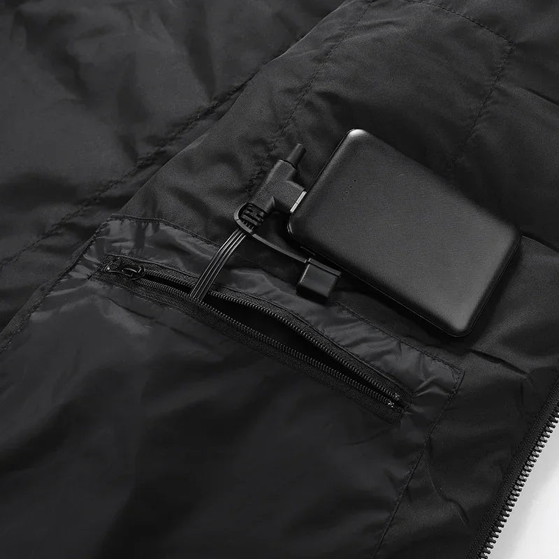 Black quilted jacket with interior zip pocket and tech accessory compartment