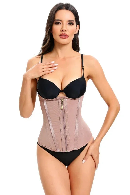 Woman wearing nude high-compression waist trainer corset over black bra and underwear