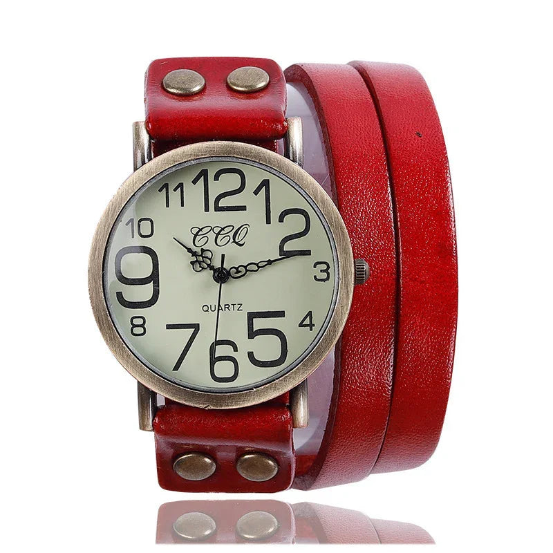Vintage-style watch with large numbers, bronze-tone case, and wide red leather wrap strap