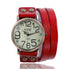 Vintage-style watch with large numbers, bronze-tone case, and wide red leather wrap strap