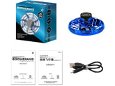 Blue plastic interactive flying UFO toy with USB charging cable and instruction manuals.