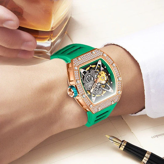 Men's luxury skeleton watch with green silicone strap, rose gold case, and diamond accents