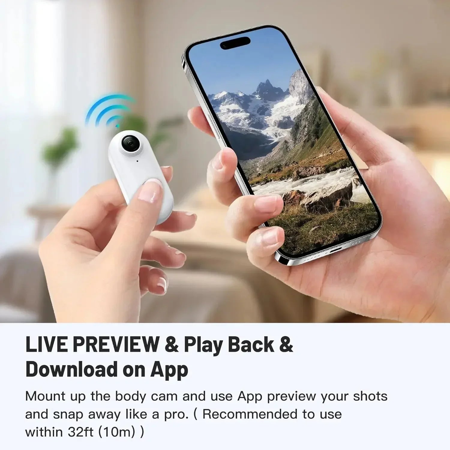 Hand holding a small white body camera streaming a mountain scene to a smartphone, modern tech accessory.