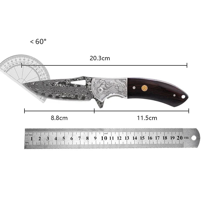 Ornate Damascus-style folding knife with engraved metal and wood handle, measured at 20.3cm long.