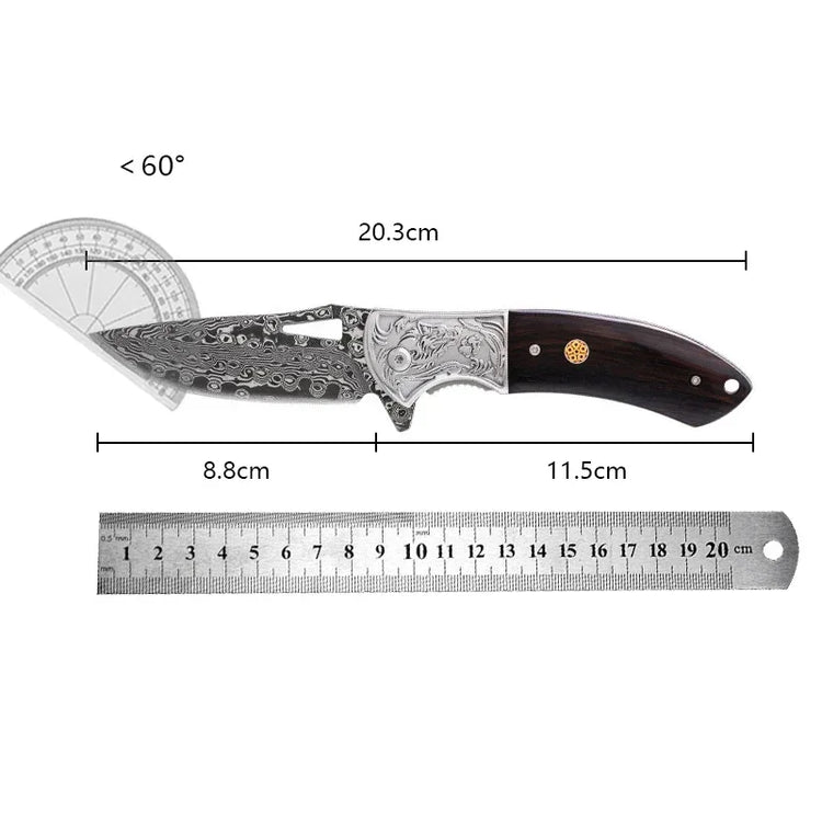 Ornate Damascus-style folding knife with engraved metal and wood handle, measured at 20.3cm long.