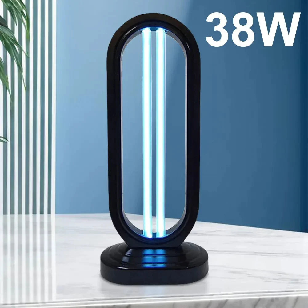 Modern 38W UV-C sterilization lamp with black frame on a marble surface, blue background.