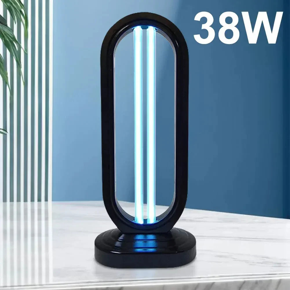 Modern 38W UV-C sterilization lamp with black frame on a marble surface, blue background.