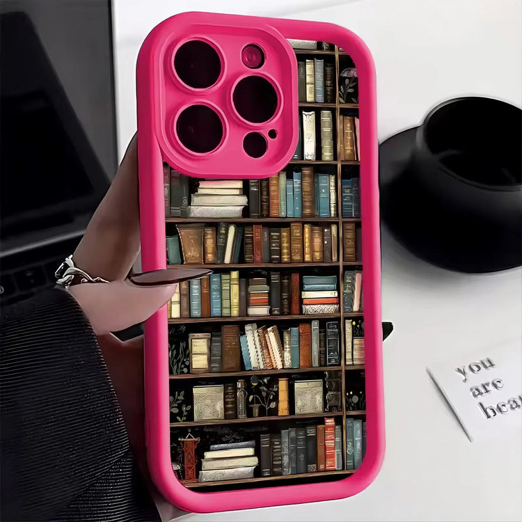 Pink phone case with bookshelf print, protective design, fits snugly, modern street style