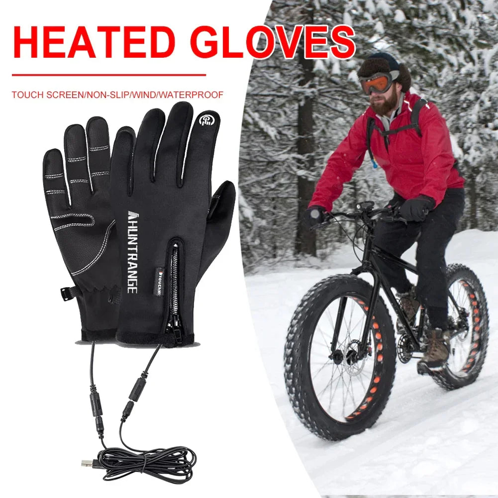 Black heated winter gloves with zipper and touchscreen feature, designed for cycling in snow.