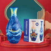 Colorful 3D puzzle vase with blue wave design, next to its packaging, on a red display.