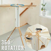 Modern wooden and white rotating clothes drying rack with 360-degree rotation feature, tripod base, suitable for indoor laundry.