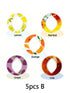 Set of five circular ring covers with fruit and drink patterns in lemon, grape, orange, cola, and Red Bull designs.