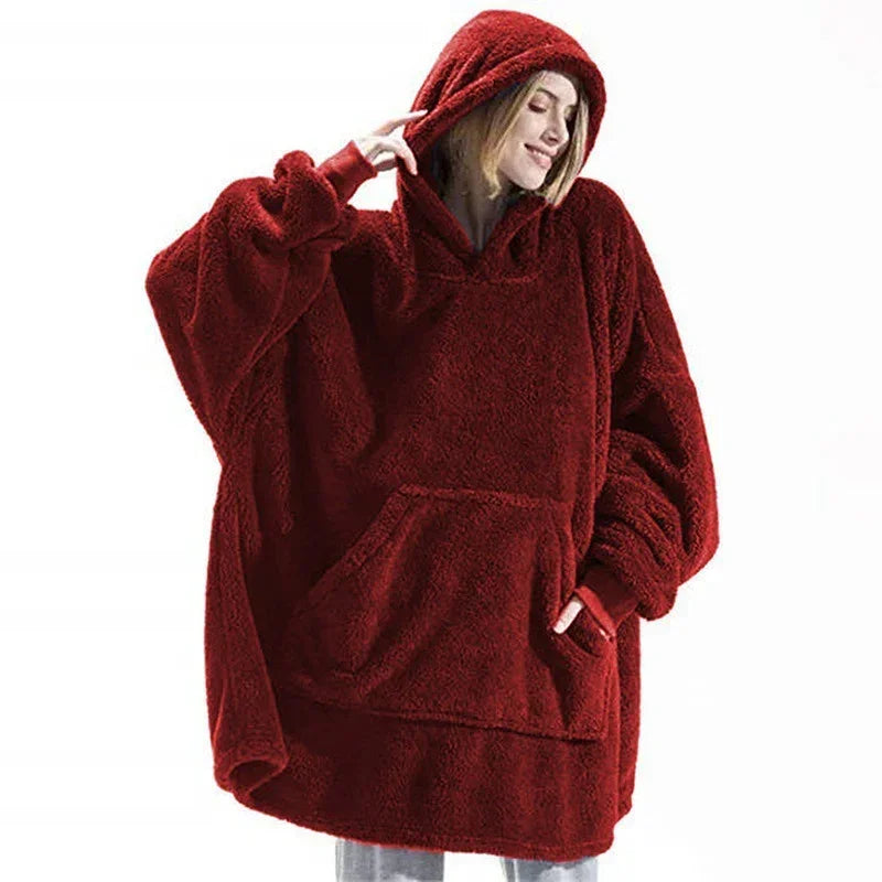 Oversized red fleece hoodie with kangaroo pocket and relaxed fit, cozy streetwear style