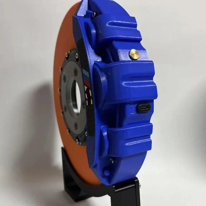 Blue and orange tech accessory with USB-C port, futuristic design, hard shell material, compact fit