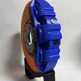 Blue and orange tech accessory with USB-C port, futuristic design, hard shell material, compact fit
