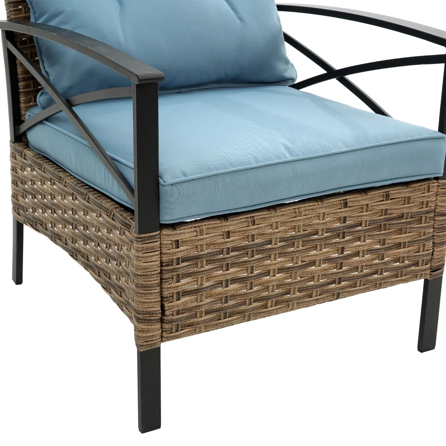 Modern outdoor chair with light blue cushions, woven rattan base, and black metal frame