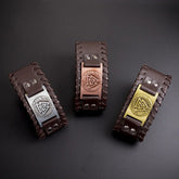 Three brown leather bracelets with metal Norse symbol plates in silver, copper, and gold tones.