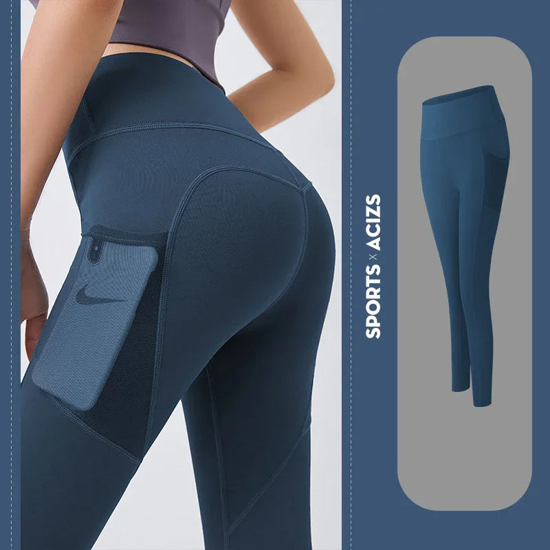 High-waisted blue athletic leggings, slim fit, with mesh pocket and stretchy fabric.