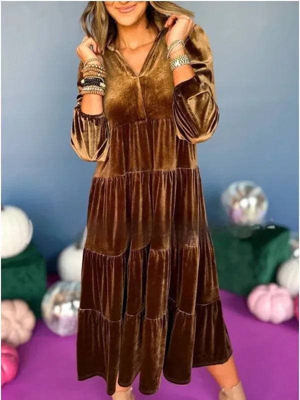 Brown velvet tiered long-sleeve midi dress with relaxed fit, worn by woman