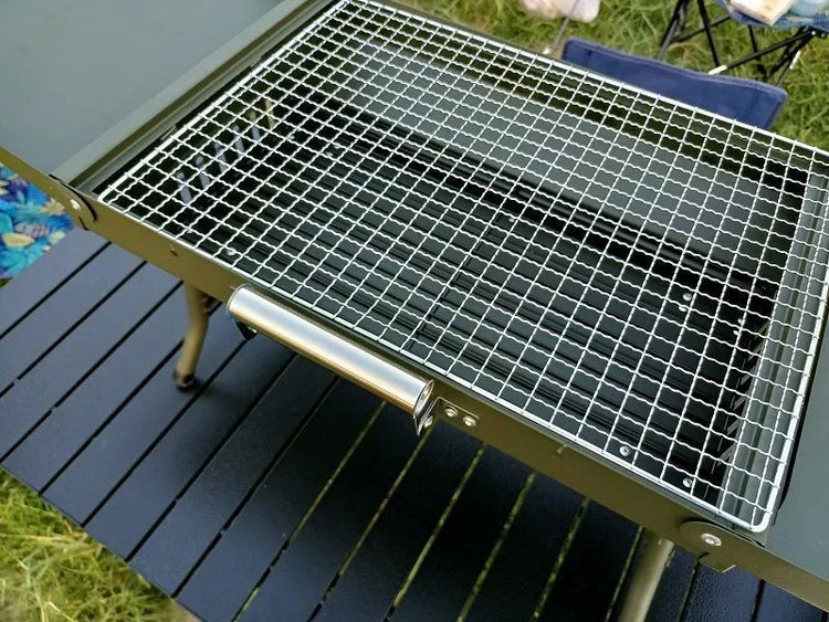 Outdoor metal grill with stainless steel mesh grate, modern minimalist design, rectangular shape