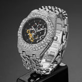 Silver iced-out skeleton watch with crystal-studded link band and openwork dial