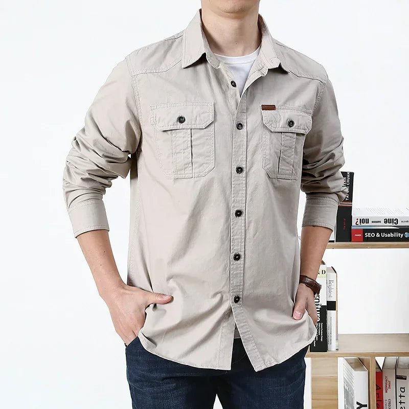 Men's beige long-sleeve button-up shirt, cotton material, relaxed fit, chest pockets.