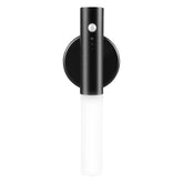 Minimalist black wall-mounted LED light with sensor and cylindrical design