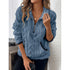 Woman wearing a blue faux fur pullover with half-zip, relaxed fit and front pockets