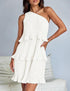 Woman wearing a white pleated one-shoulder ruffle mini dress, relaxed fit.