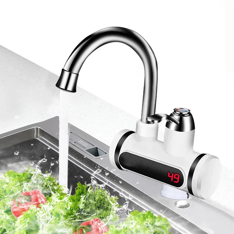 Modern stainless steel kitchen faucet with digital temperature display and running water over fresh vegetables in a sink