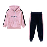 Pink and black velour hoodie and jogger set with relaxed fit and embroidered text detail