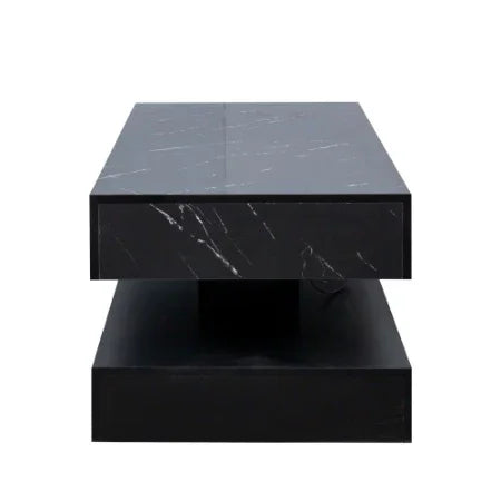 Modern rectangular black marble coffee table with minimalist design and glossy finish