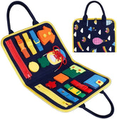 Navy blue sensory activity busy board with colorful zippers, buckles, and soft fabric patches.