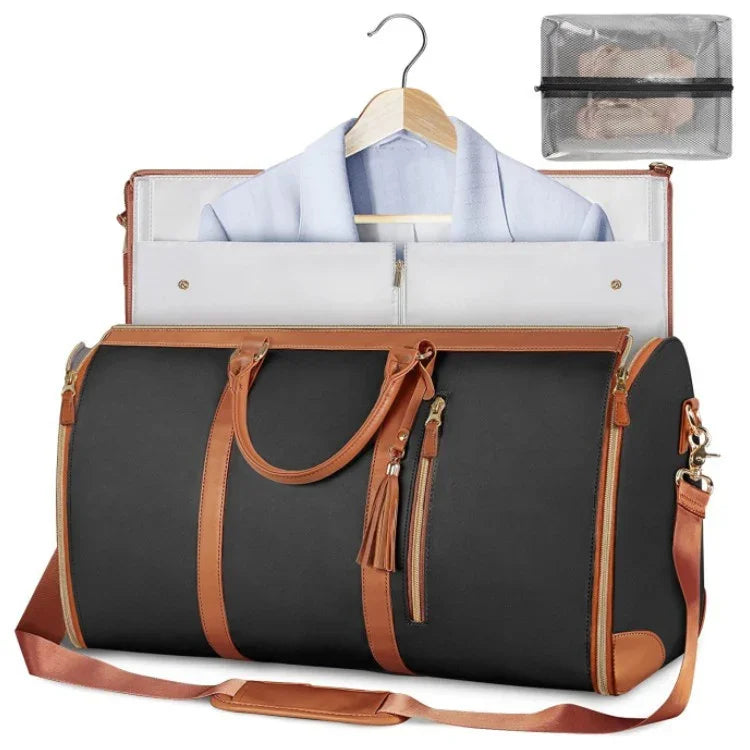 Black and brown leather garment duffel bag with shoulder strap and organized suit storage