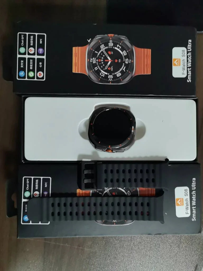 Black and orange smartwatch with silicone perforated strap and digital display in package.