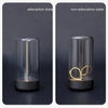 Modern glass cylinder table lamp with adjustable gold filament, black base