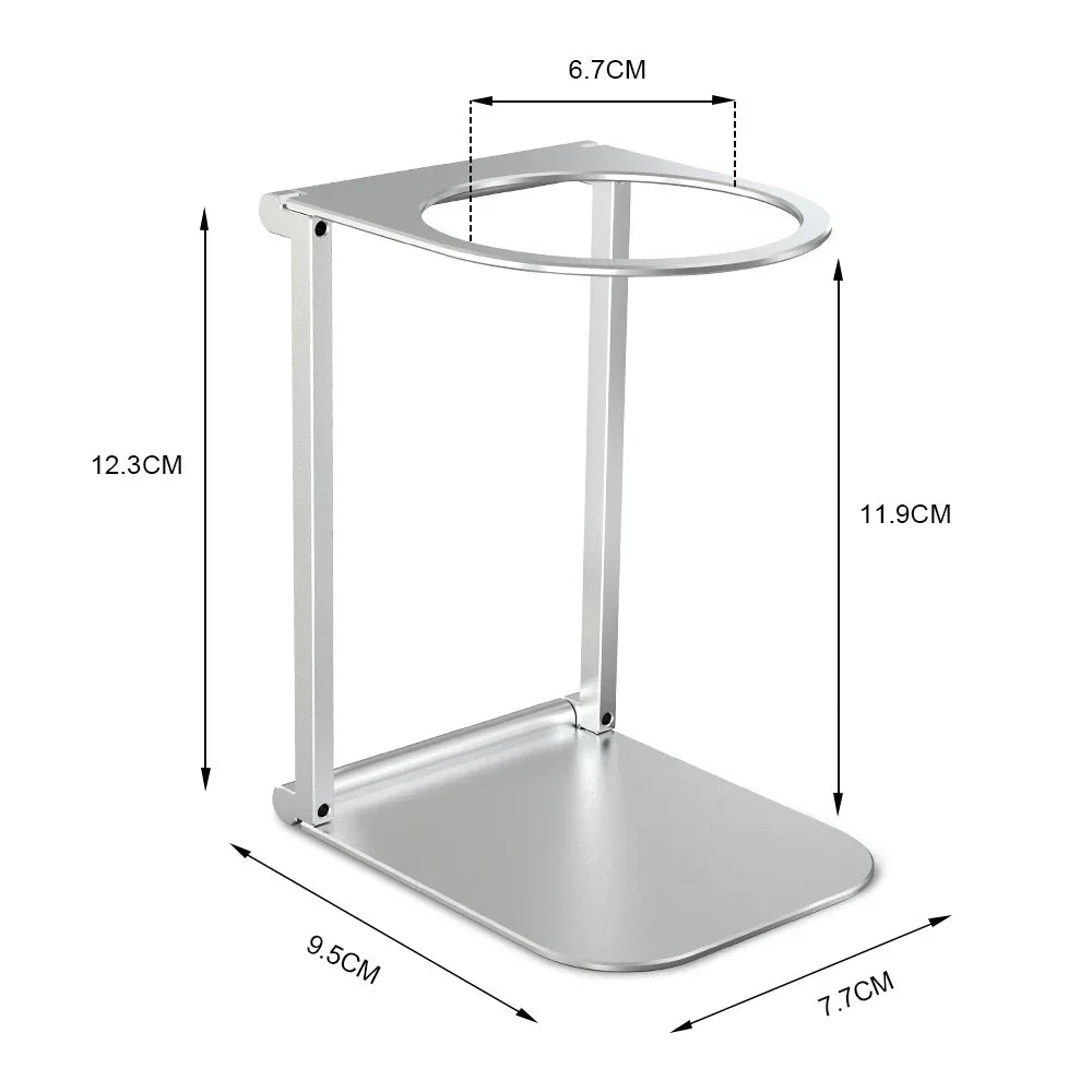 Minimalist silver metal stand with rounded base, open circular top, and dimensions labeled.
