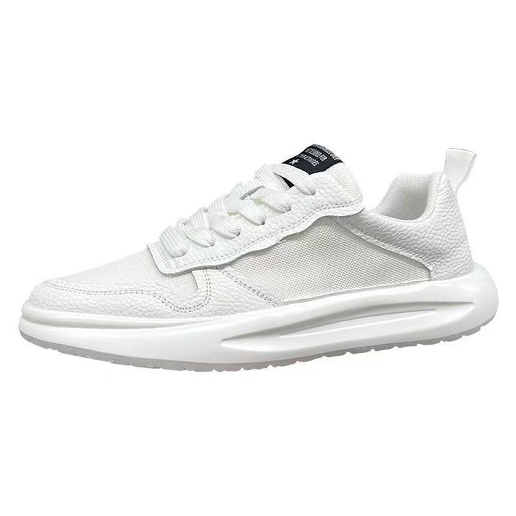 White low-top sneaker with mesh and textured panels, lace-up closure, and chunky sole.