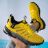 Yellow mesh running sneakers with black sole, sporty design, breathable and lightweight fit