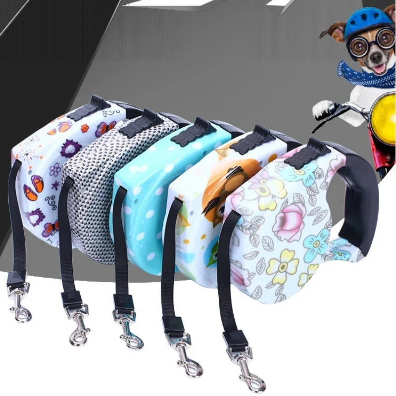 Colorful retractable dog leashes with floral, animal, and polka dot patterns, plastic handles
